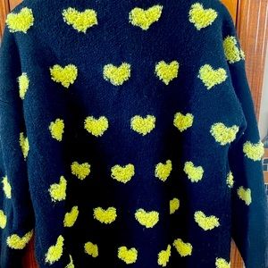 Cute black and yellow heart cardigan. Excellent condition.